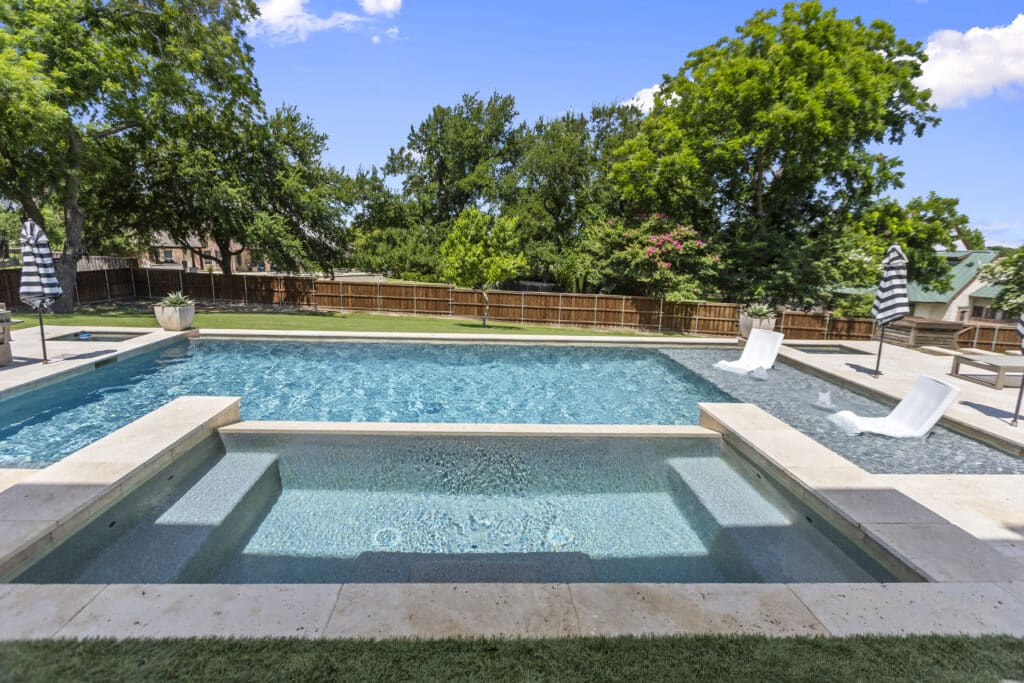 Geometric pool with jacuzzi.