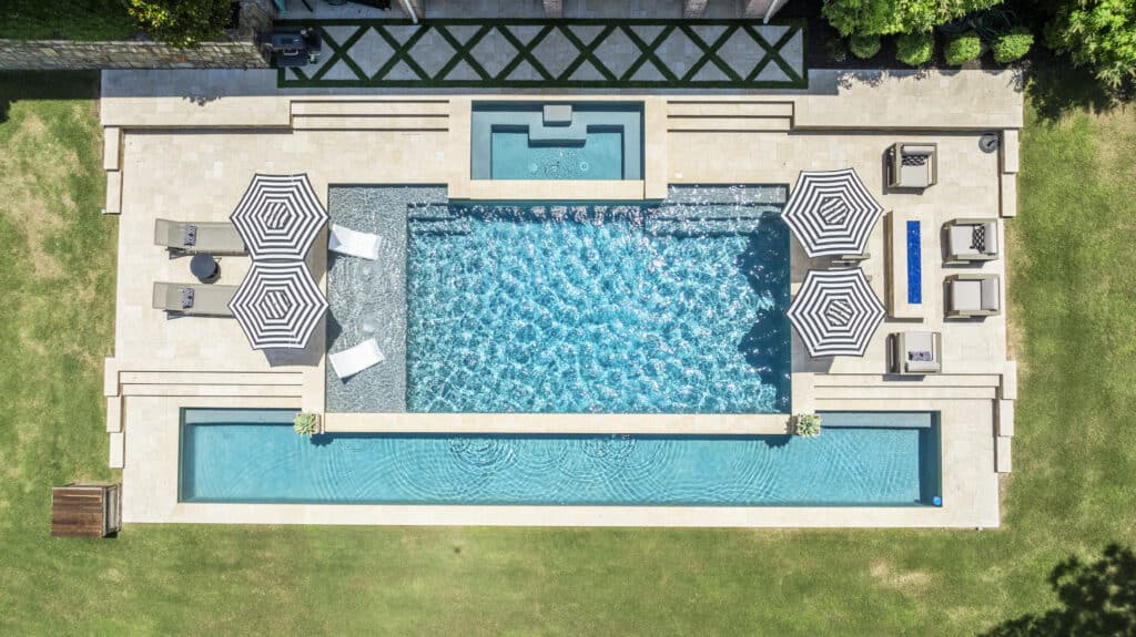 Geometric pool with jacuzzi birds eye view.