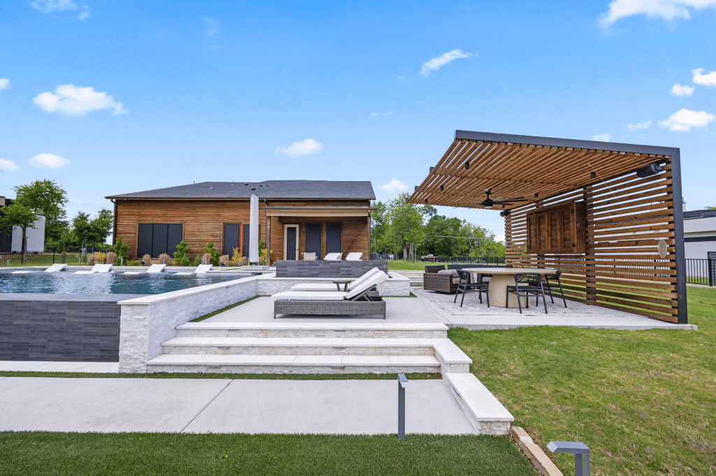 Geometric pool with sun loungers.