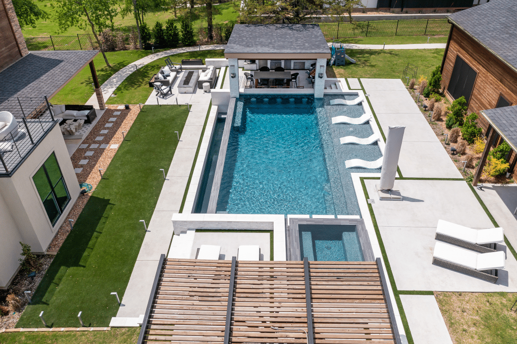 Geometric pool with sun loungers.