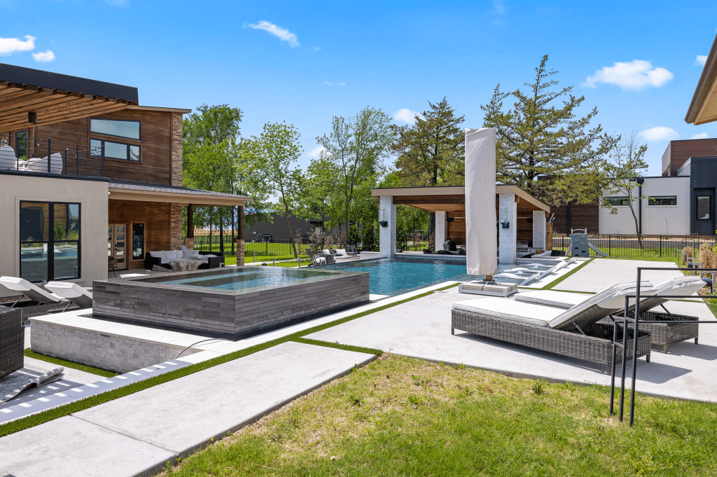 Geometric pool with sun loungers.